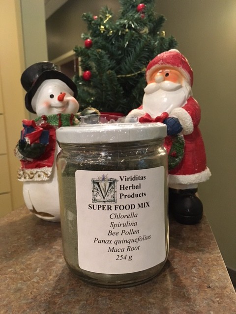 superfood mix in a picture with frosty and santa in Mississauga at Erin Mills Optimum Health
