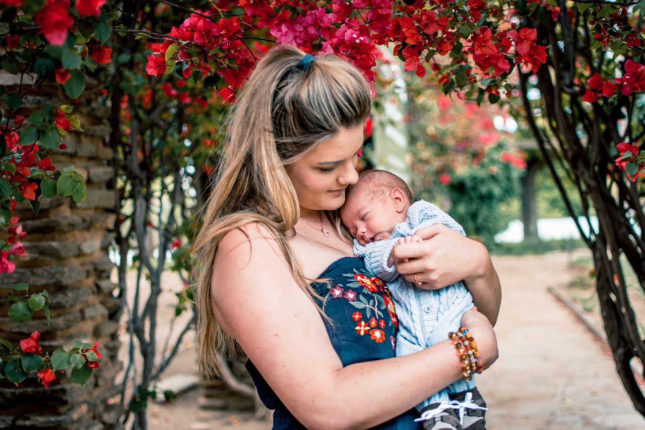 mom holding a new baby